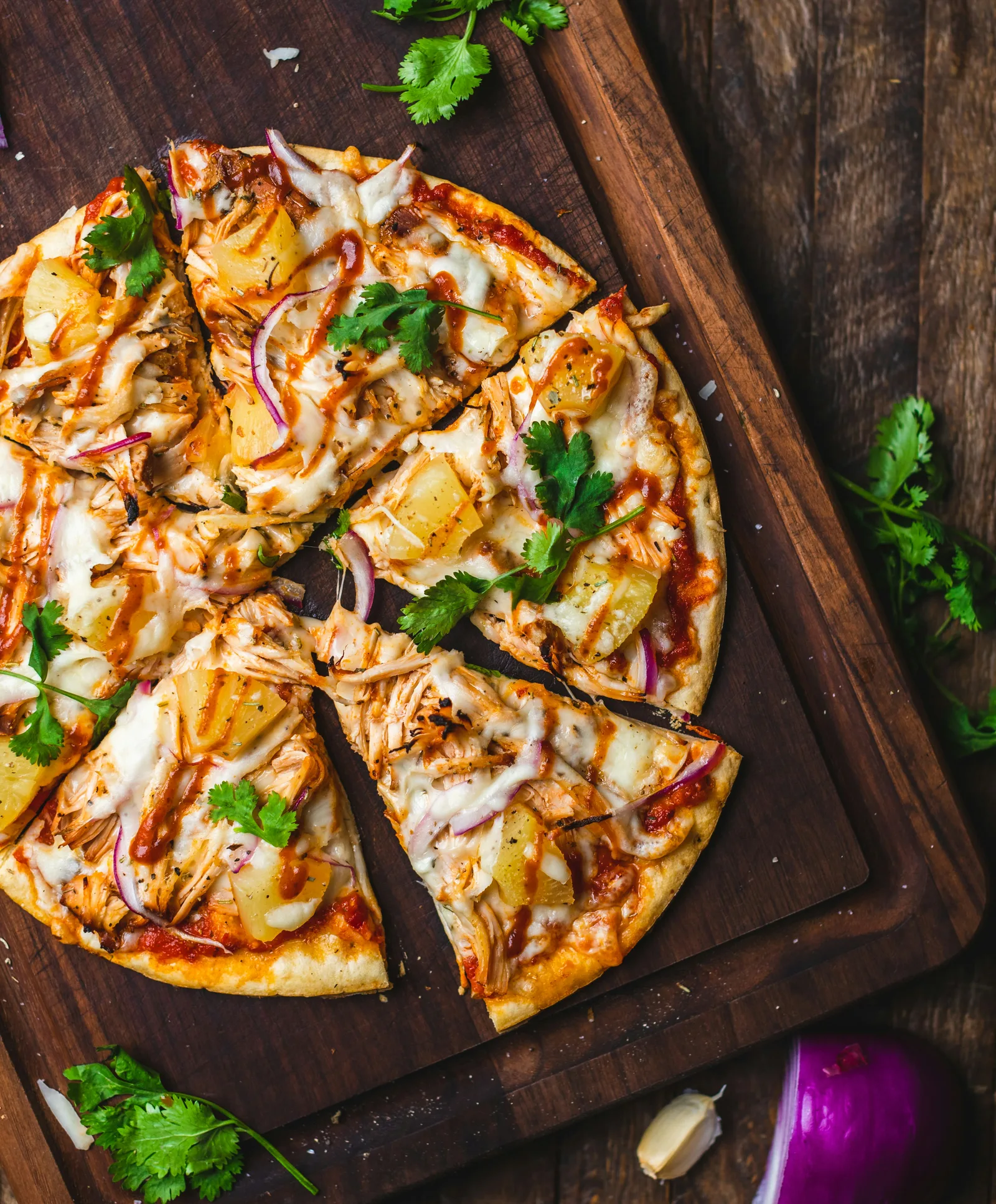 Beautifully crafted wood-fired pizza at Mosaic Kitchen ready to be served